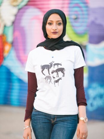 woman in white and black crew neck t-shirt